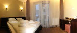 Курортные отели Amarena SPA Hotel Буковель Двухместный номер Делюкс с 1 кроватью или 2 отдельными кроватями-11